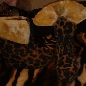 Stylish fur winter wedge bootie. Never worn.